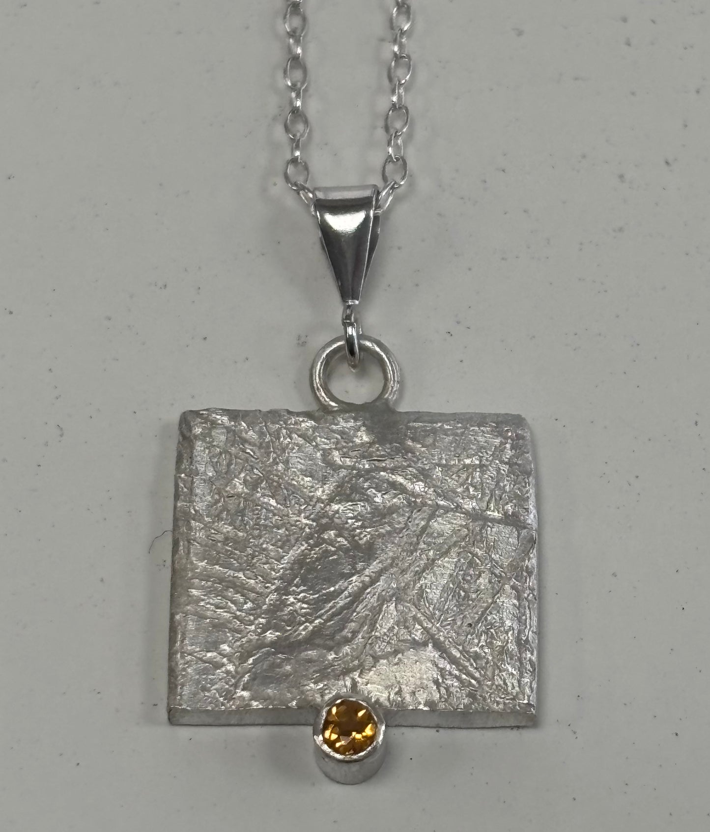 Sterling silver textured pendant